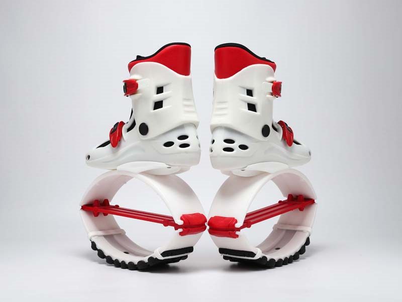 Real side-view pair photo of white and red jump shoes for retail assortment comparison